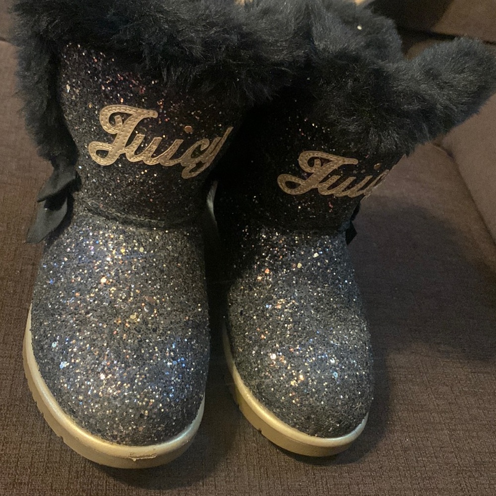 Glitter juicy. Couture boots one scuff in front of right boot.